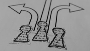 a close up of a piece of paper with arrows